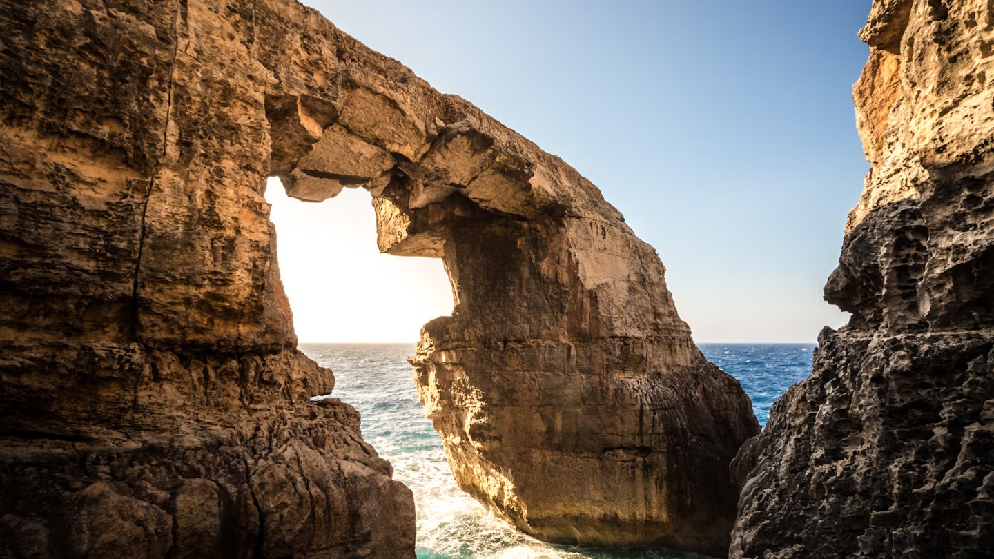 Wied il-Mielah sea arch at sunset, Gozo